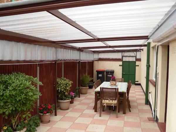 brown_traditional_canopy_covered_patio_area