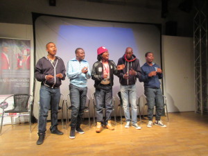 Group singing at film preview