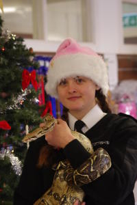 Animal care assistant Emma Russell with Sally the boa