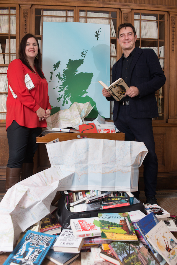 Clara Berry from People's Postcode Lottery and Nick Barley from Edinburgh International Book Festival plan new events across Scotland thanks to support from PPL c Alan McCredie