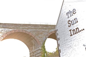 The Sun Inn below the bridge