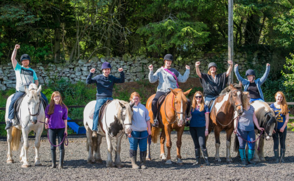 Photographer Ian Georgeson, 07921 567360 Pic: Asda staff visit  Ravelrig riding school Balerno to raise money for the charity and Tickled Pink