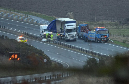 JON SAVAGE PHOTOGRAPHY 07762 580971 www.jonsavagephotography.com 26th Jan 2016 TWO LORRIES LIE ON THEIR SIDES THIS MORNING AFTER HIGH WINDS TOPPLED THEM ON THE A1 ROUTE BETWEEN HADDINGTON AND DUNBAR IN EAST LOTHIAN.