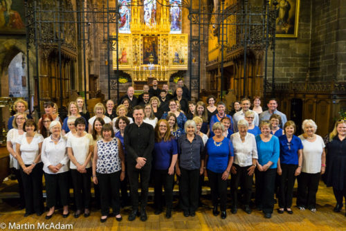 Fergus Linehan poses with the Edinburgh City Singers and Calton Consort ahead of the recital at St Paul's 