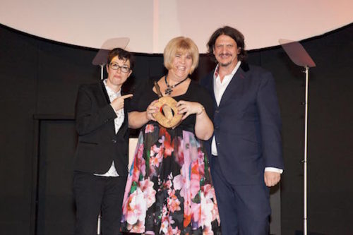Best reader's recipe award winner Kerry Teakle, for her whisky, orange and almond cake recipe is presented with her award by Sue Perkins and Jay Rayner. The Observer Food Monthly awards 2016, held at Freemasons Hall in central London, 13 October 2016