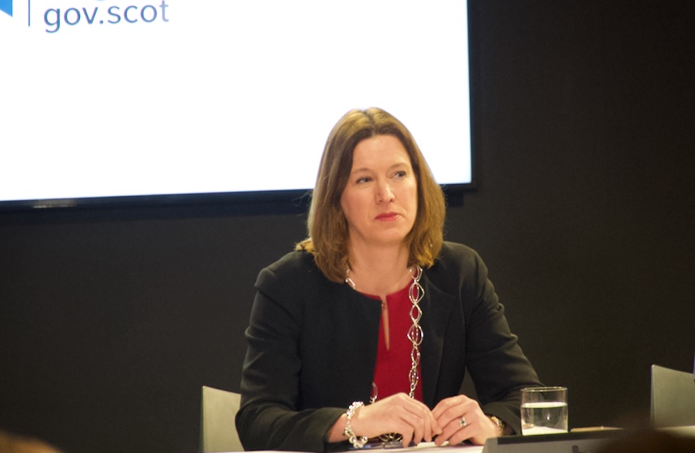 Dr Catherine Calderwood the Chief Medical Officer at a media briefing sitting behind a desk