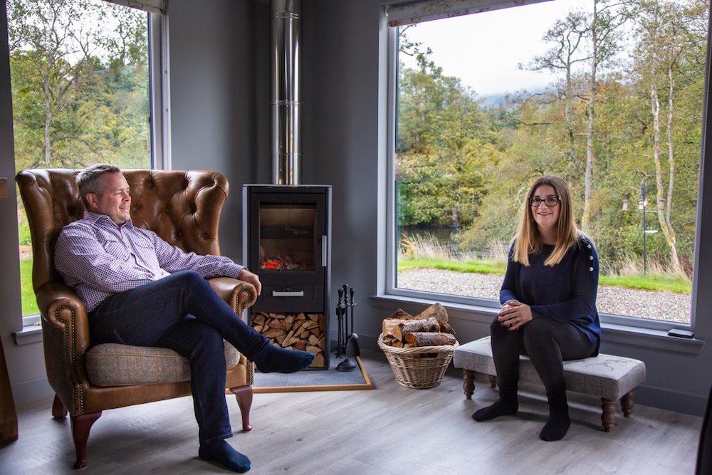 Alex and Daniela relaxing  in front of the log fire