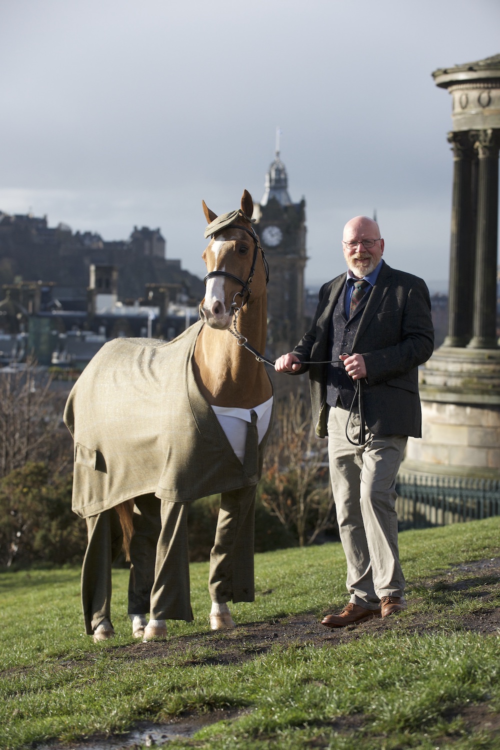 Racehorse Franklee on Calton Hill posing in a shirt and tie outfit with Gordon Nicolson